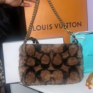 Coach x Jennifer Lopez collection fuzzy purse